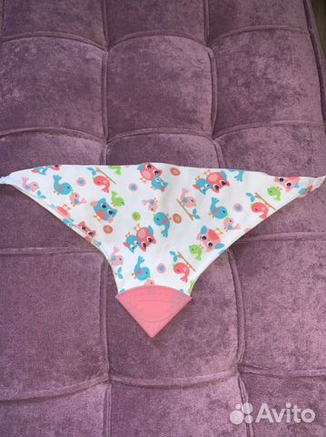 Слюнявчик с прорезывателем