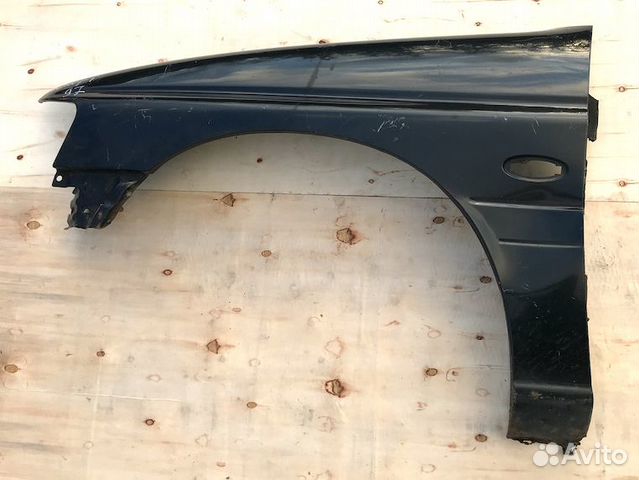 Крыло левое Форд Эскорт Турнир 1997