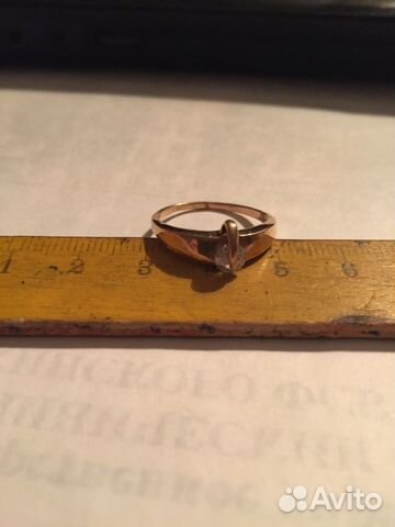 Золотое кольцо с подвижным цирконом