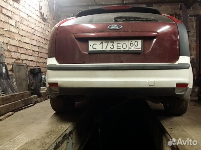 Фонарь заднего хода левый Ford Focus 2