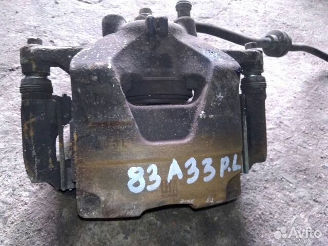 Суппорт тормозной передний левый на Opel Astra J