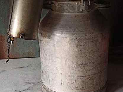 Chennai gal oiling her milk cans