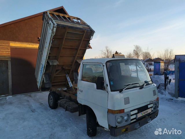 Ниссан атлас 1990