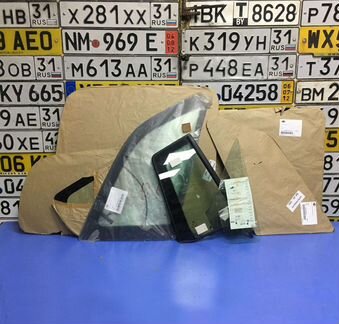 Стекло боковое опускное для Cadillac левый руль