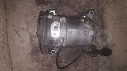 Компрессор кондиционера Subaru Impreza 73111FE030