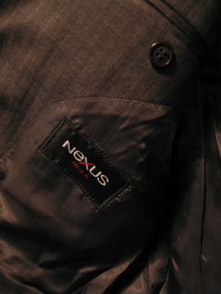 Пиджак серый на треx пуговицаx