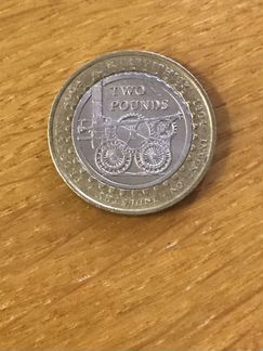 Обмен 2 фунтами Великобритании